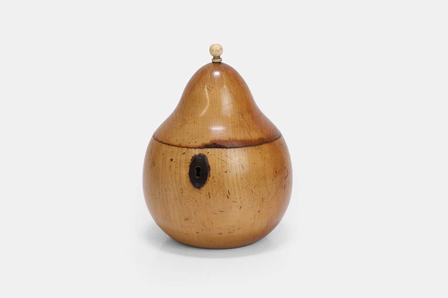 Lot 116 - A treen fruitwood tea caddy