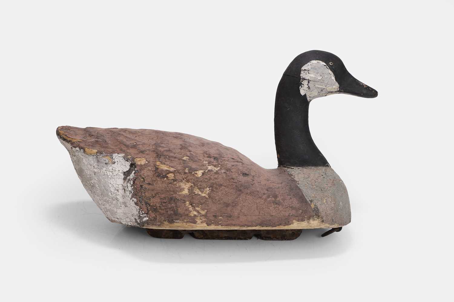 Lot 114 - A painted wooden decoy