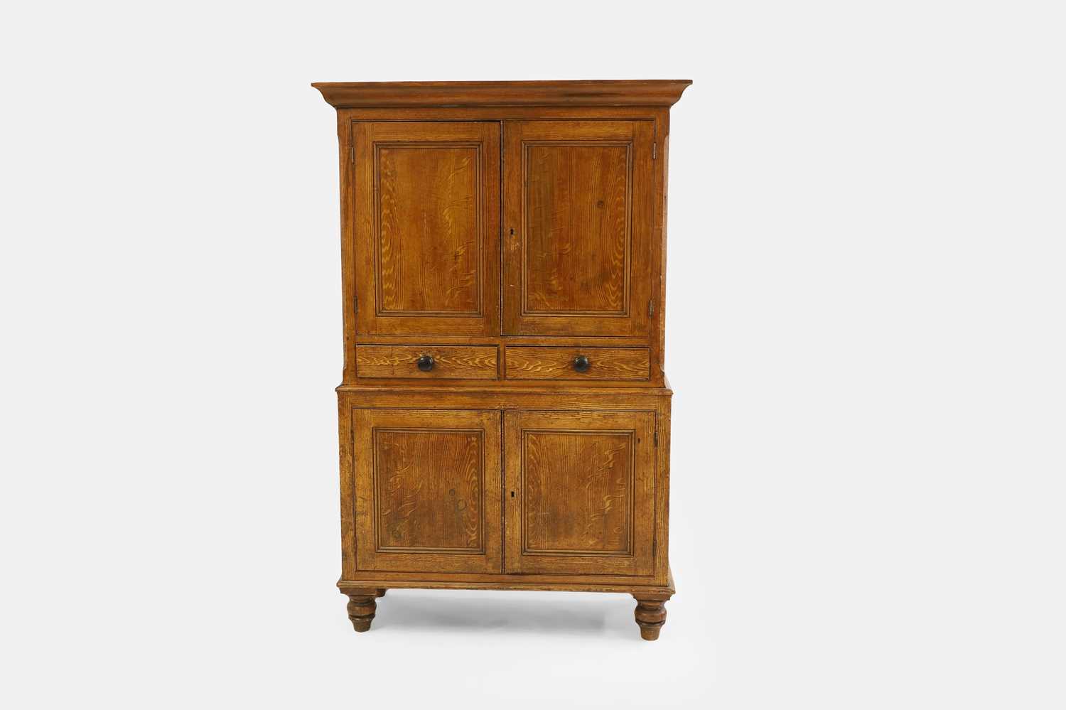 Lot 124 - A Victorian scumbled pine linen press