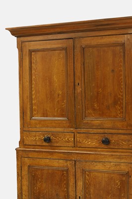 Lot 124 - A Victorian scumbled pine linen press