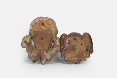 Lot 100 - Two carved wood putti heads