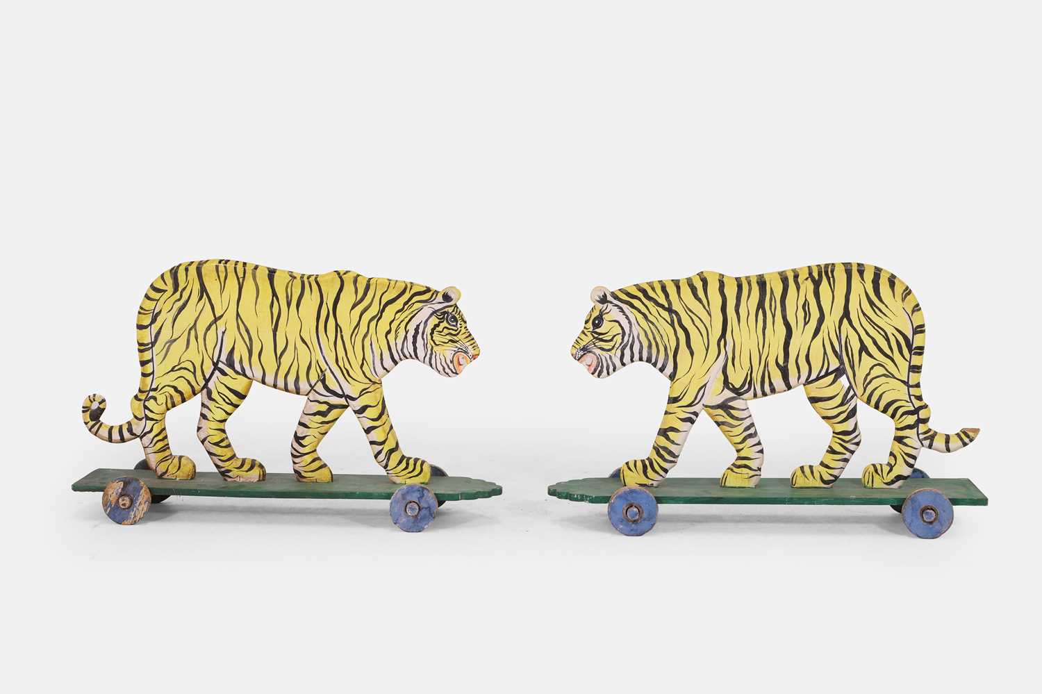 Lot 354 - A pair of painted wooden 'pull-along' tigers