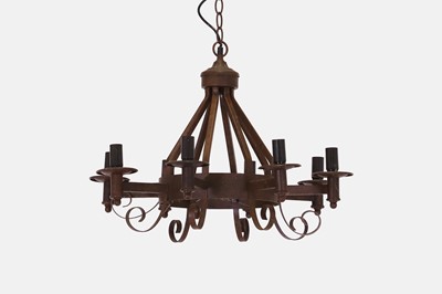 Lot 482 - An iron eight-branch chandelier