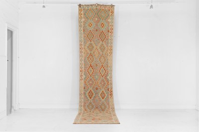 Lot 630 - A flat-weave wool runner of Anatolian design