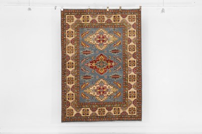 Lot 126 - An Oushak wool rug of Shirvan design