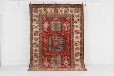 Lot 651 - An Oushak wool carpet of Karachov Kazak design