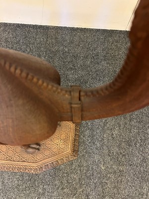 Lot 96 - A pair of teak camel occasional tables
