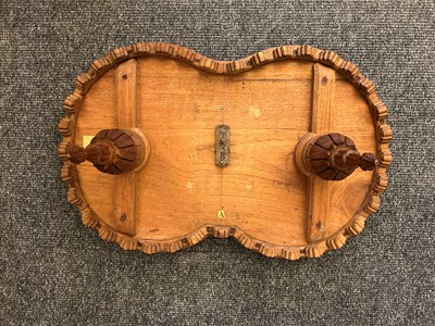 Lot 96 - A pair of teak camel occasional tables