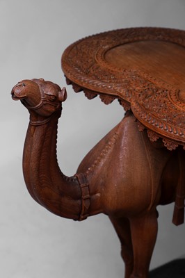 Lot 96 - A pair of teak camel occasional tables
