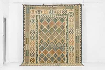 Lot 330 - A kilim flat-weave wool carpet of Anatolian design