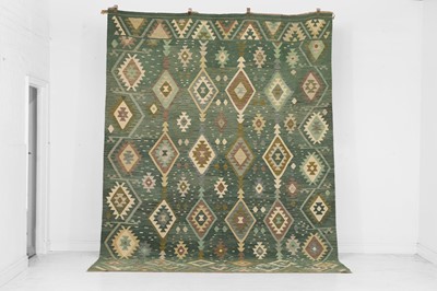 Lot 164 - A kilim flat-weave wool carpet of Anatolian design