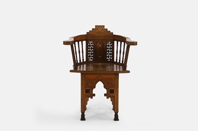 Lot 503 - A Damascus walnut and marquetry elbow chair