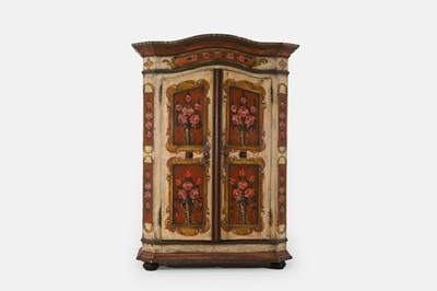Lot 223 - A painted pine marriage cupboard