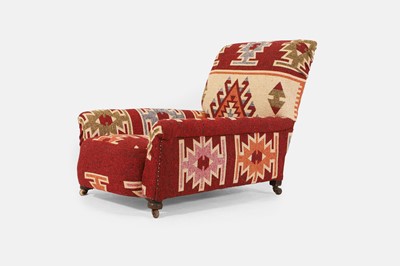 Lot 487 - An upholstered armchair
