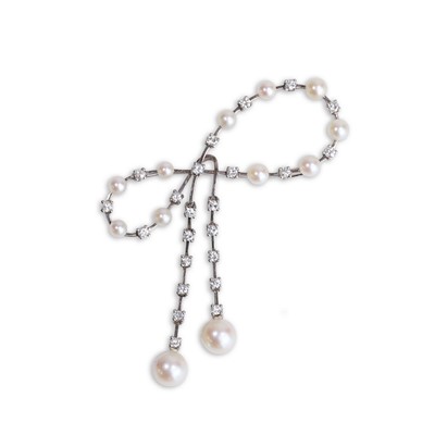 Lot 48 - A diamond and pearl bow brooch