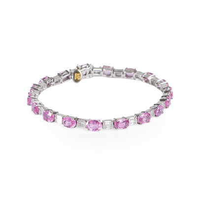 Lot 154 - An 18ct white gold pink sapphire and diamond line bracelet