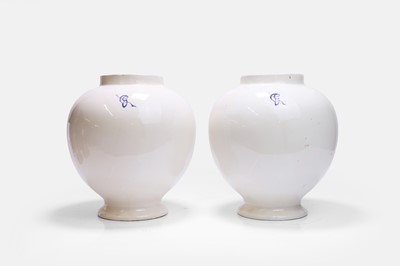 Lot 499 - A pair of tin-glazed earthenware jars
