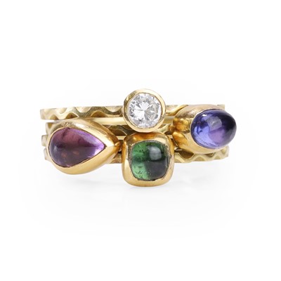Lot 113 - A set of four gemstone set stacking rings