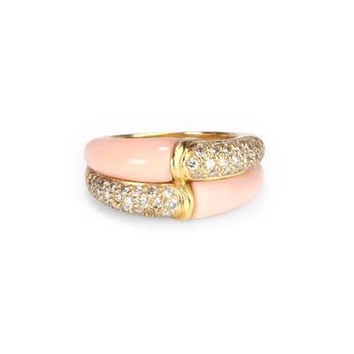 Lot 167 - An angel skin coral and diamond ring