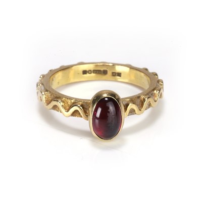 Lot 112 - An 18ct gold cabochon garnet ring