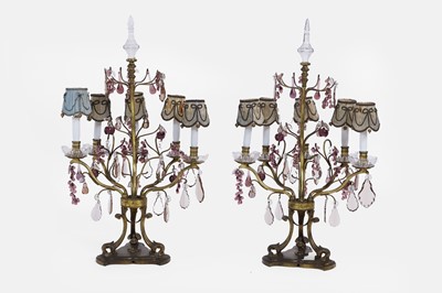 Lot 432 - A pair of gilt-brass, clear and amethyst glass table lamps