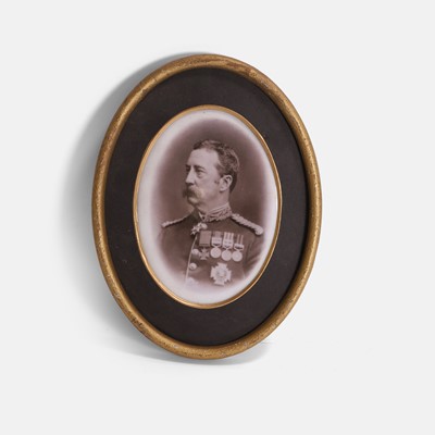Lot 256 - An oval porcelain plaque of a Victoria Cross medal recipient