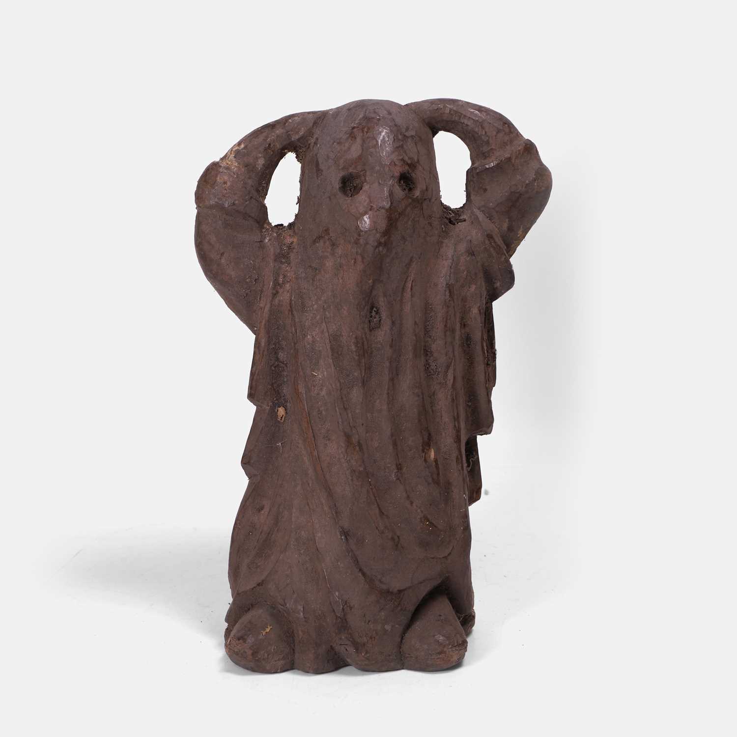 Lot 18 - A spooky carved wooden ghost sculpture