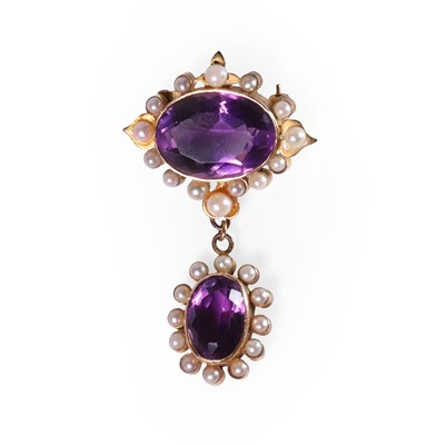 Lot 24 - A Victorian amethyst and split pearl drop brooch