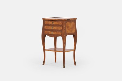 Lot 563 - A transitional kingwood, amaranth and tulipwood table en chiffonier