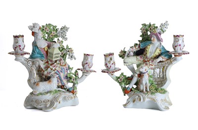 Lot 150A - A pair of continental figural candelabra