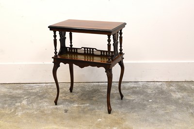 Lot 572 - A rosewood and boxwood strung book table