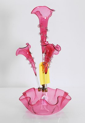 Lot 155 - A Victorian cranberry glass four-trumpet epergne