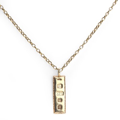 Lot 359 - A 9ct gold ingot pendant on chain