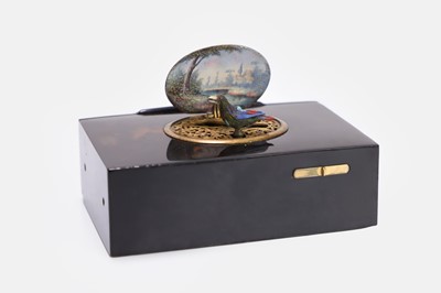 Lot 613 - A tortoiseshell cased singing-bird box