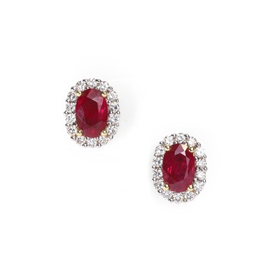 Lot 59 - A pair of 18ct gold ruby and diamond cluster stud earrings
