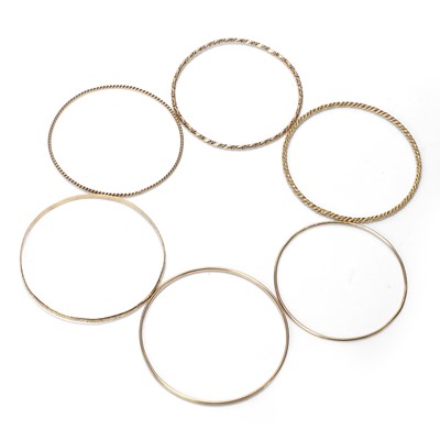Lot 297 - A group of six gold bangles