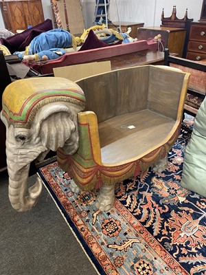 Lot 181 - A carved wooden settee