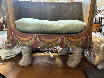 Lot 181 - A carved wooden settee