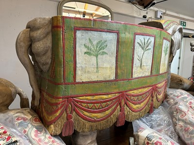Lot 181 - A carved wooden settee