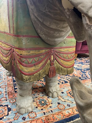 Lot 181 - A carved wooden settee