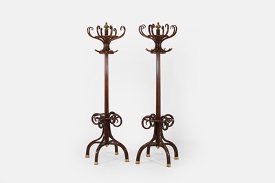 Lot 496 - A pair of bentwood and brass-mounted coat stands