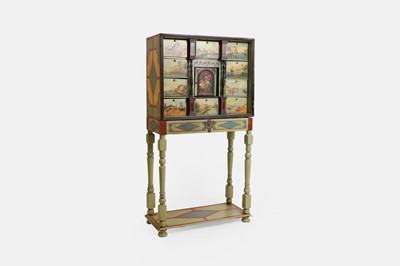 Lot 31 - A painted wooden chest-on-stand