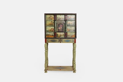 Lot 31 - A painted wooden chest-on-stand