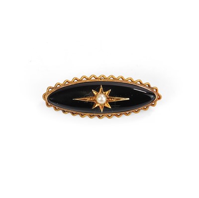 Lot 19 - A Victorian gold and onyx mourning brooch