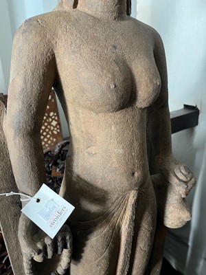 Lot 288 - A pre-Khmer carved sandstone figure of Vishnu