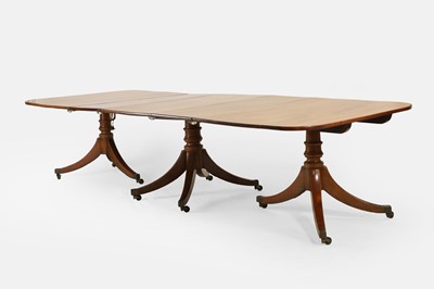 Lot 205 - A George III mahogany three-pillar dining table