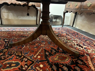 Lot 205 - A George III mahogany three-pillar dining table