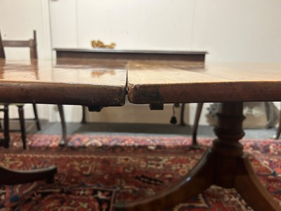 Lot 205 - A George III mahogany three-pillar dining table