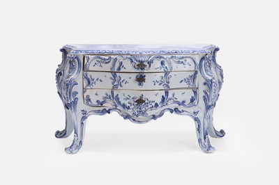 Lot 653 - A delft miniature commode
