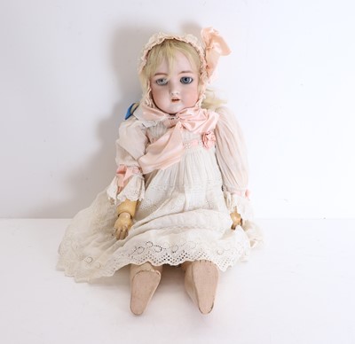 Lot 310 - A late Victorian bisque headed doll